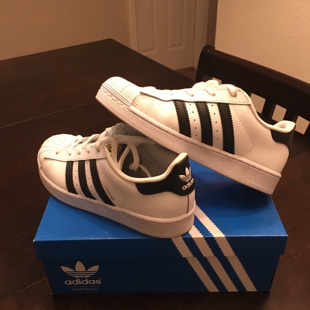 White Adidas Superstars